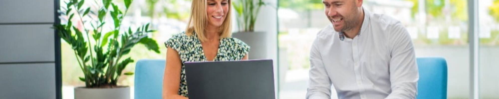 Two people discussing Recruitment Process Outsourcing (RPO)