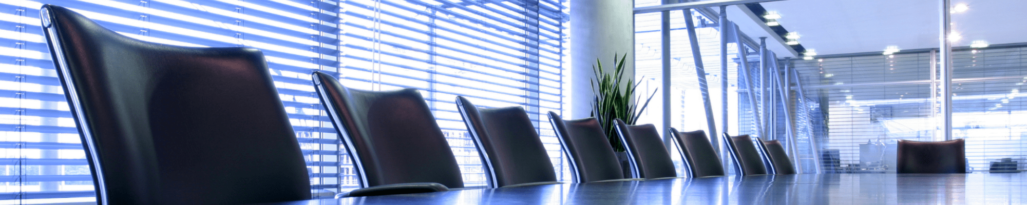 boardroom with empty chairs