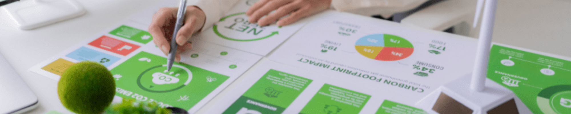 woman with ESG posters and charts on desk